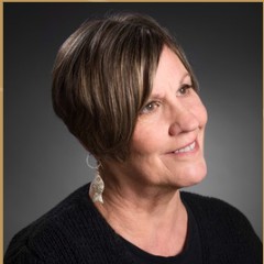 A professional headshot photo of author Sarah Freligh